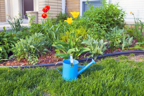 Operative wearing PPE using gardening equipment safely